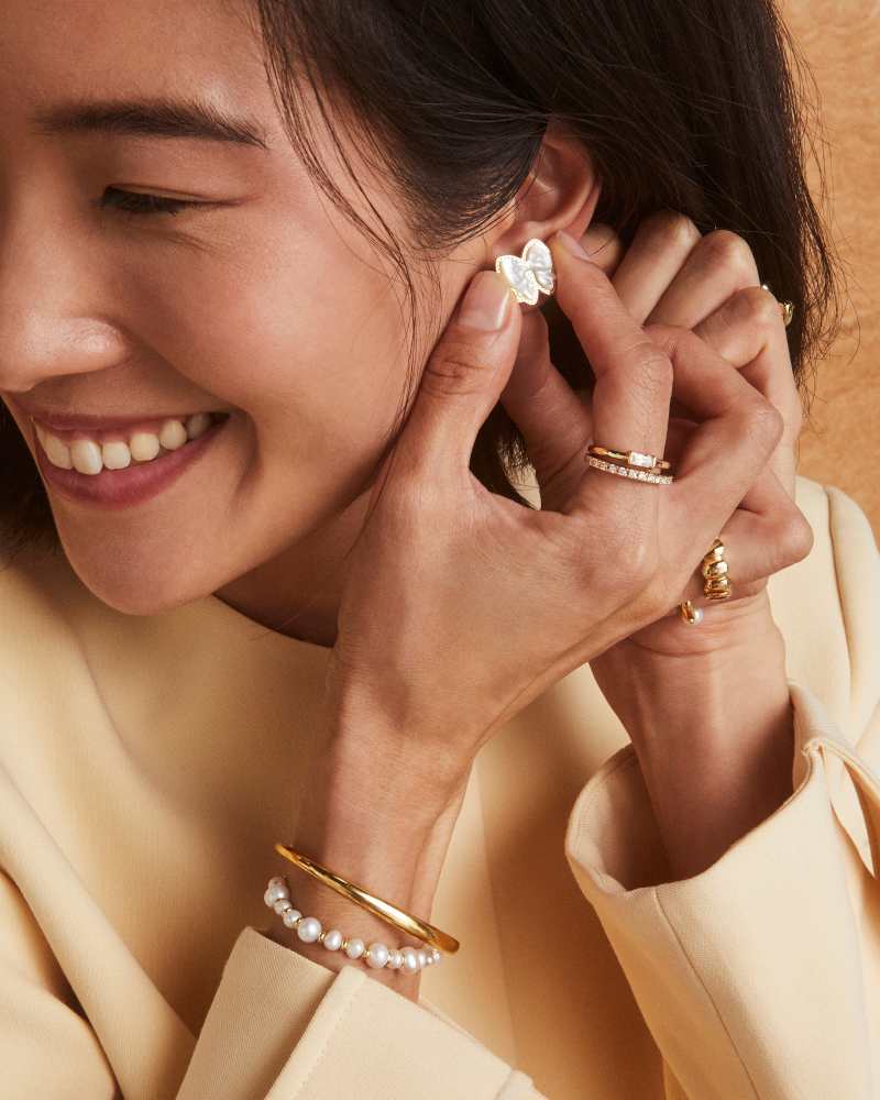 Haley Gold Bow Stud Earrings in Ivory Mother of Pearl