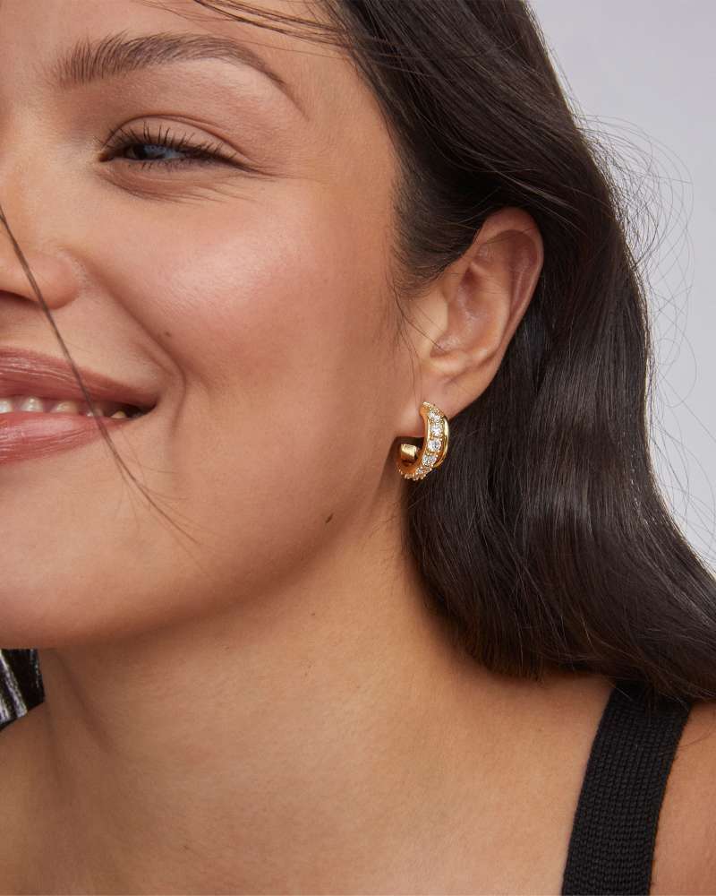 Livy Gold Huggie Earrings in White Crystal