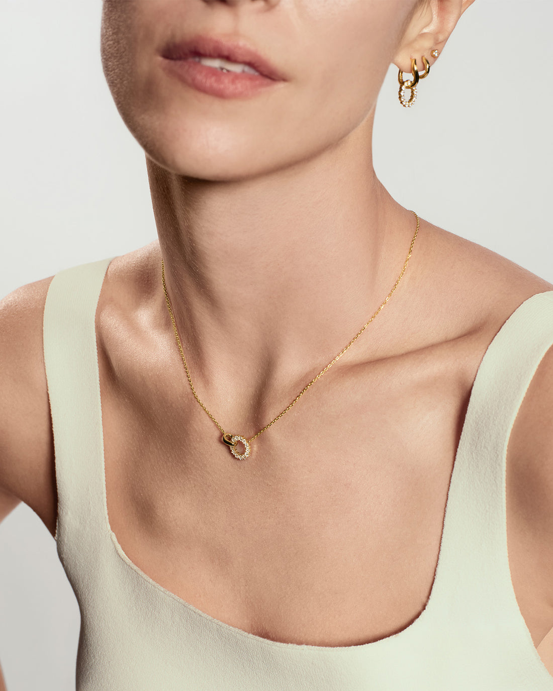 Gold Pavé Interlocked Huggie Hoop Earrings