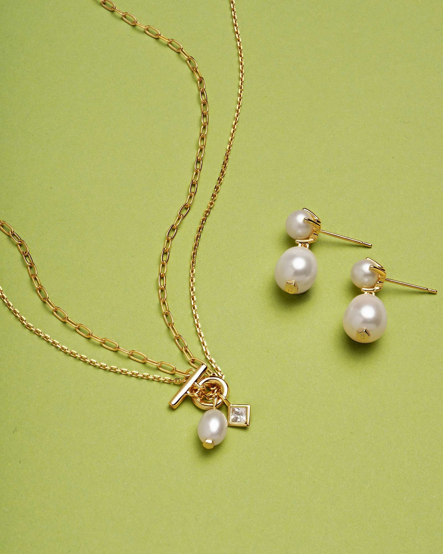 Eve Gold Drop Earrings in White Pearl