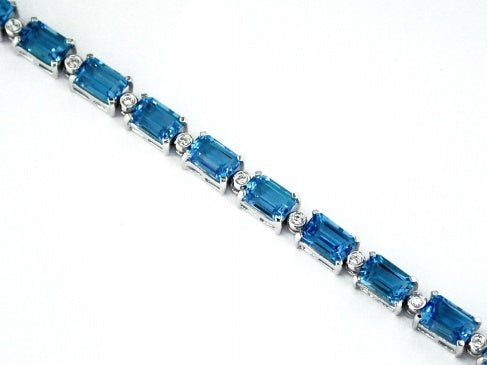 14kt White Gold Blue Topaz and Diamond Bracelet